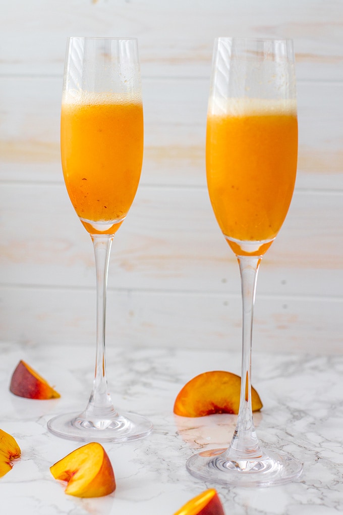 Bellinis Two Ways - Classic Peach and Rosemary Plum - Nourish and Fete