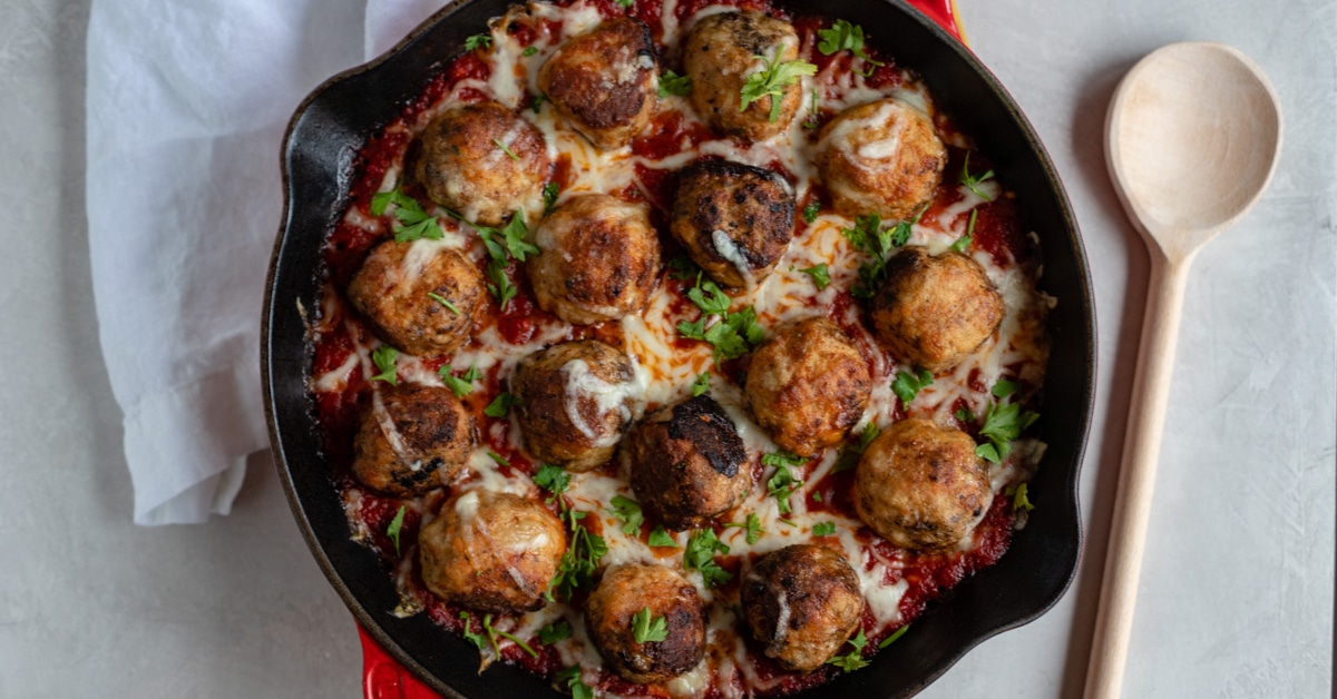 Mozzarella-Stuffed Chicken Parmesan Meatballs - Nourish and Fete