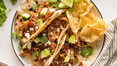 https://www.nourish-and-fete.com/wp-content/uploads/2021/11/crockpot-shredded-chicken-tacos-3-480x270.jpg