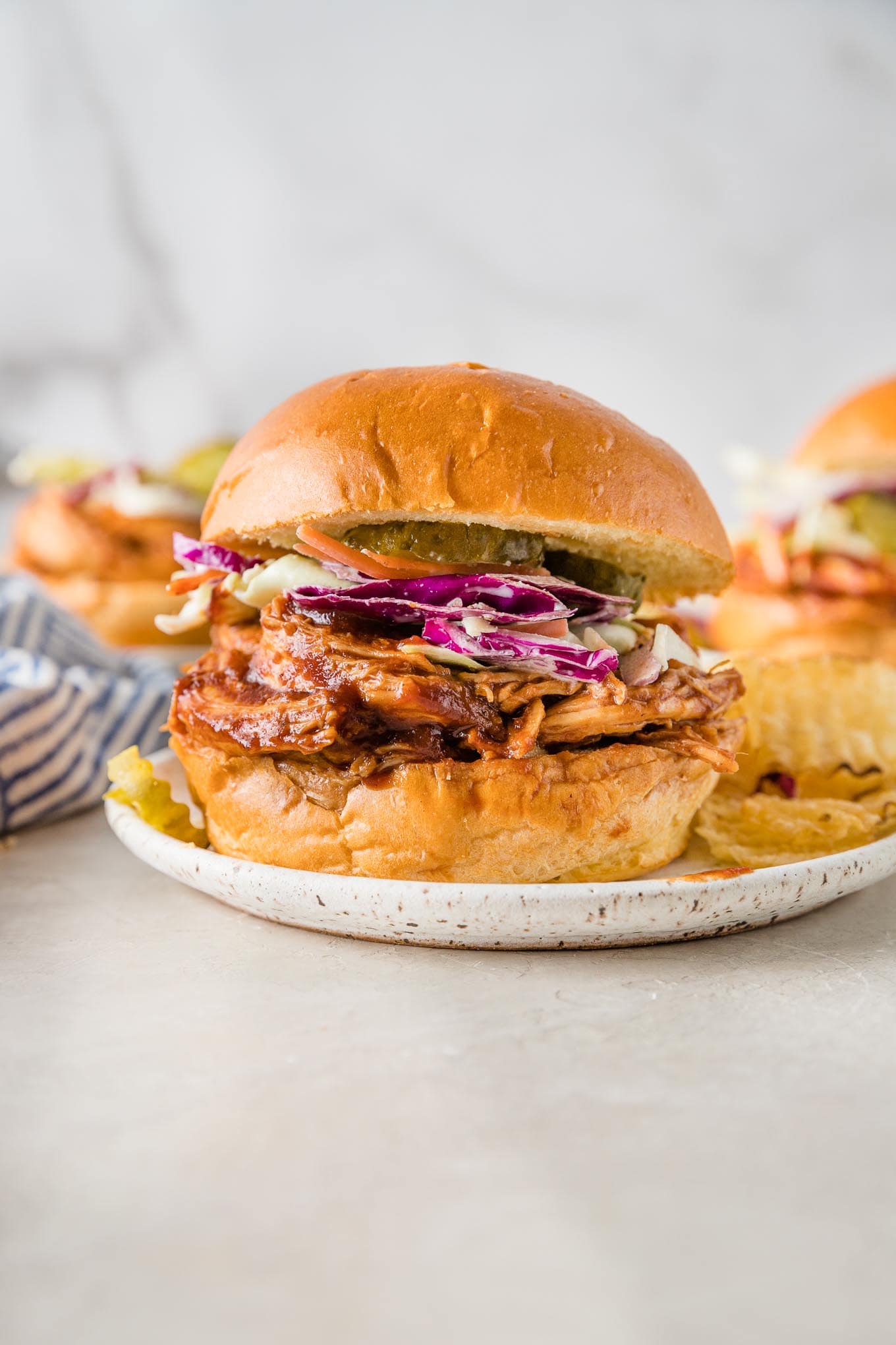 https://www.nourish-and-fete.com/wp-content/uploads/2023/07/bbq-chicken-sandwiches-4.jpg