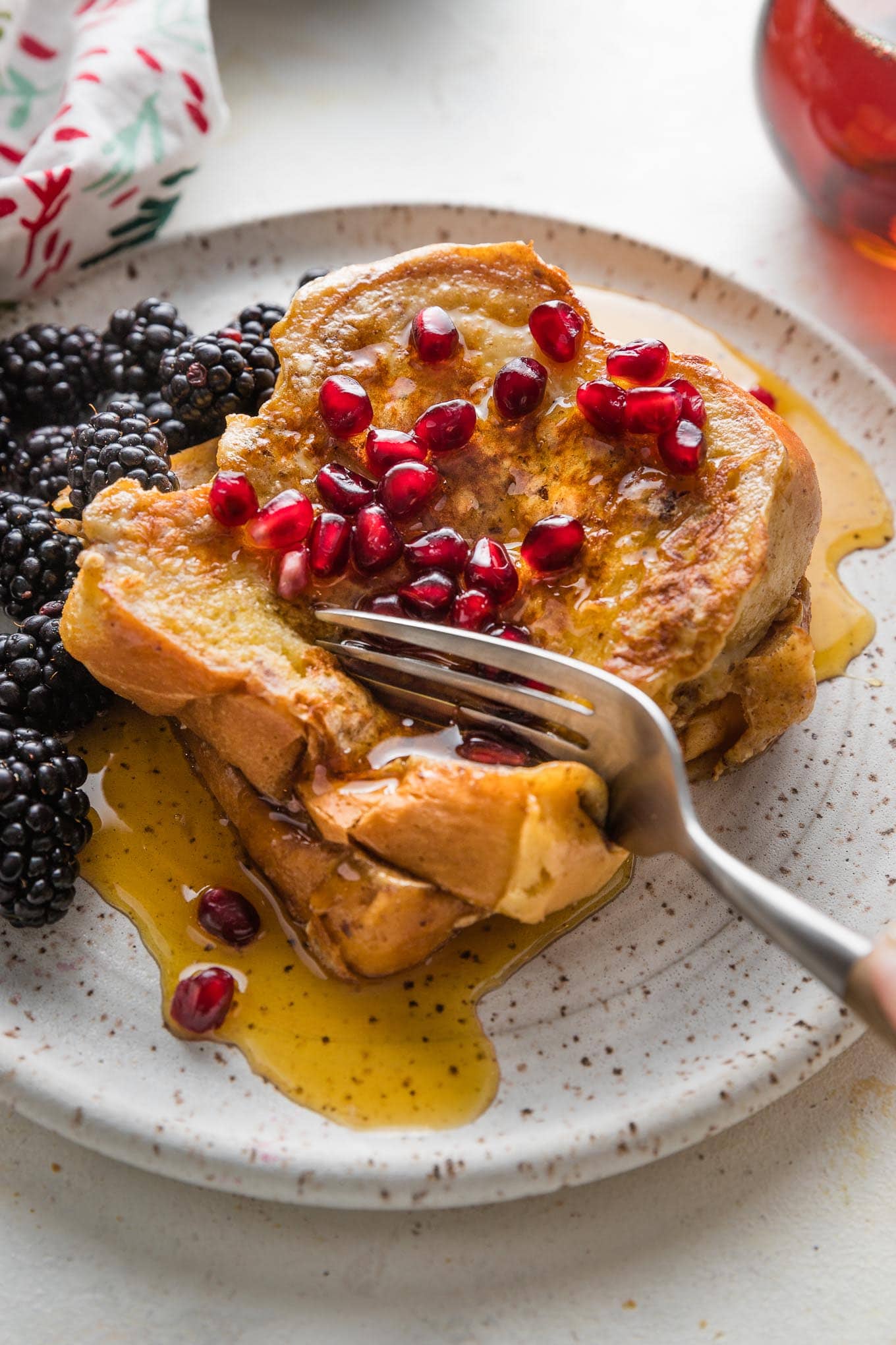 https://www.nourish-and-fete.com/wp-content/uploads/2023/12/eggnog-french-toast-8.jpg