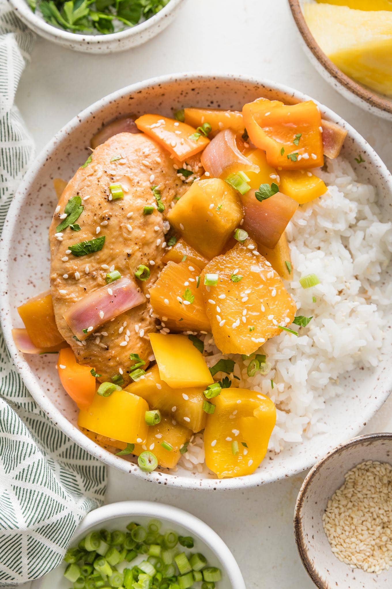 https://www.nourish-and-fete.com/wp-content/uploads/2024/01/crockpot-pineapple-chicken-4.jpg